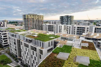 Flachdachbegrünung als Teil des Wohnraums einer modernen Wohnsiedlung.