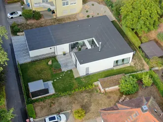 Referenzbericht BMI Architektenbungalow_Foto 1 (Luftbild)